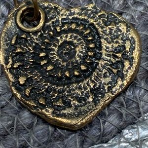 Waxing poetic brass heart charm